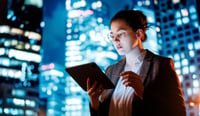 Businesswoman using tablet stock photo for genai adoption concept