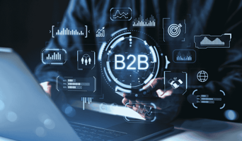 B2B technology interface with digital marketing and data analytics icons surrounding businessman using smartphone and laptop in business concept. stock photo.jpg