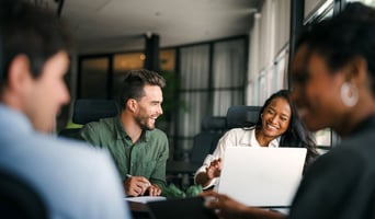 Group of young multi-ethnic startup business team collaborating on project in modern office as purpose led team high performance culture concept stock photo
