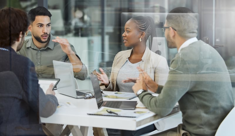 Image for Shot of a group of businesspeople having a meeting in an office at work stock photo