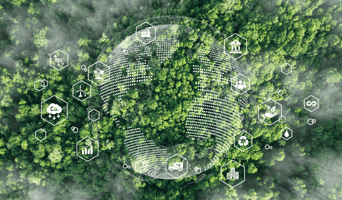 Aerial shot of a forest with globe and tech icons over as circular business model tech stack concept