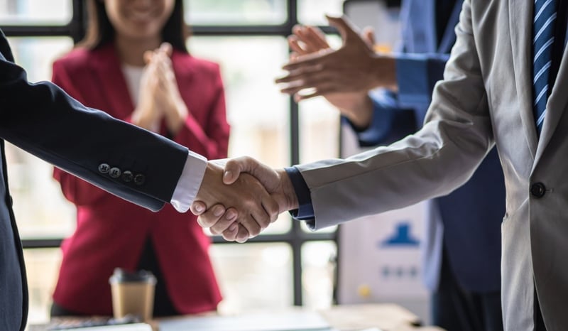 Image for Business partner meeting, Collaboration of people in organizations, colleagues congratulate successful projects. M&A, post merger integration PMI stock photo