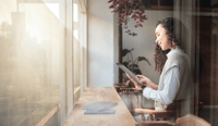 Cafe, tablet and business woman reading report, research statistics or customer experience feedback data. Restaurant store, commerce coffee shop and morning person review hospitality consumer insight, the impact of customer experience on S/4HANA concept stock photo.jpg